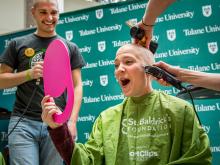 Med students go bald in support of childhood cancer research.