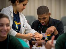 High schoolers learn the basics from Tulane medical students.