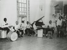 Drummer Matthew “Fats” Houston, far left, plays with Houston and Dumaine Dixieland Jazz Band in the University College Building at Tulane circa 1945. 