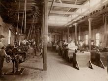 Students work in the machine shop laboratory of the mechanic arts program in the Tulane University College of Technology, circa 1905. 