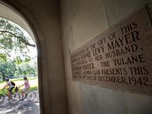 Business school’s history of moving forward is written in stone.