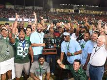 Green Wave football fans celebrate past and present victories on Saturday night in Yulman Stadium.