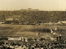 The Tulane Green Wave hosts a packed house for a game versus the LSU Tigers in the early days of the old Tulane Stadium circa 1930. 