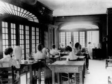 Early artists in the Newcomb College Pottery program Hattie Joor, Mary Richardson, Esther Elliot, Charlotte Payne, Effie Shepard, Mazie Ryan and Mary Butler work in the studio on the old Washington Avenue campus, circa 1905.