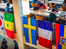 Flags adorn the Lavin-Bernick Center to commemorate International Education Week hosted by the Center for Global Education