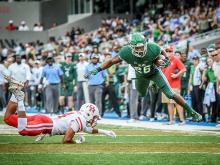 Green Wave holds on to bowl prospects with victory over Houston.