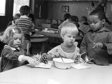 Students at the Newcomb Children’s Center make christmas ornaments circa 1975. 