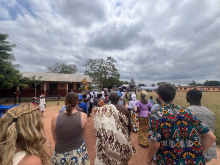 Tulane Engineers Without Borders students in parade with community members 