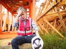 Sweating worker enduring heat