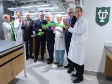 Tulane President Michael A. Fitts with top university leaders at the Hutchinson Memorial Building ribbon cutting