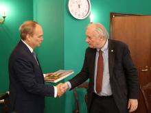 Tulane professor William Brumfield (right) receives a handshake from Russian Ambassador Anatoly Antonov during Brumfield’s visit to the Russian Embassy in Washington, D.C. (Photo courtesy of the Embassy of Russia in the USA) 