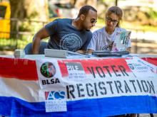 Student organizations get out to enlist new voters.
