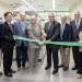 President Mike Fitts cuts the ribbon with researchers at the new Primate Center building