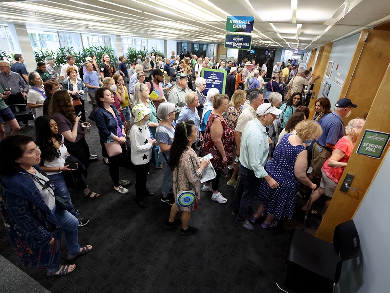 Festivalgoers make their way into the Kendall Cram Lecture Hall for the next author presentation. The three-day celebration of literature and culture featured over 130 renowned and rising authors participating in over 80 sessions.