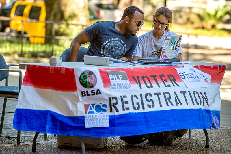 Student organizations get out to enlist new voters.